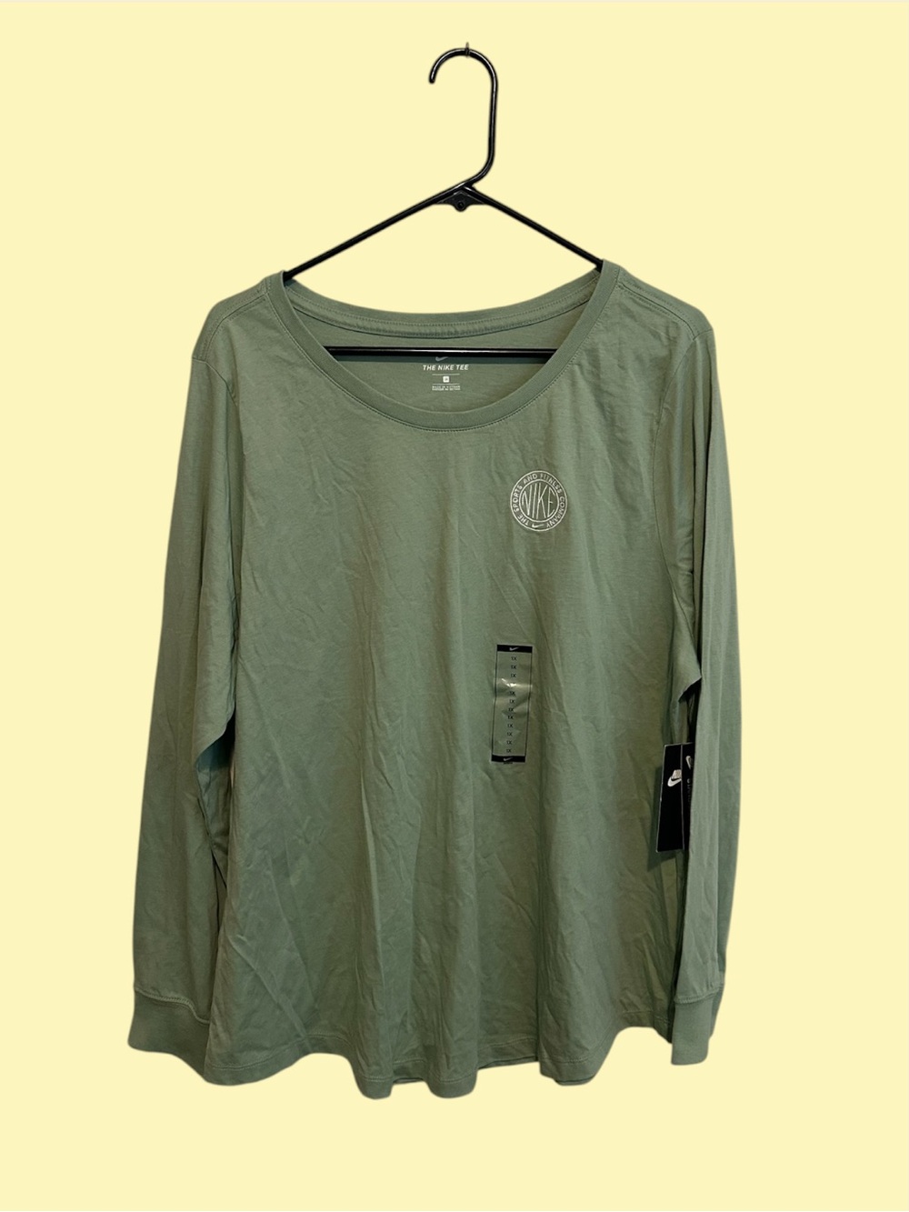 NWT Nike Women's Sportswear Femme Long-Sleeve T-Shirt in the "Steam" sage green